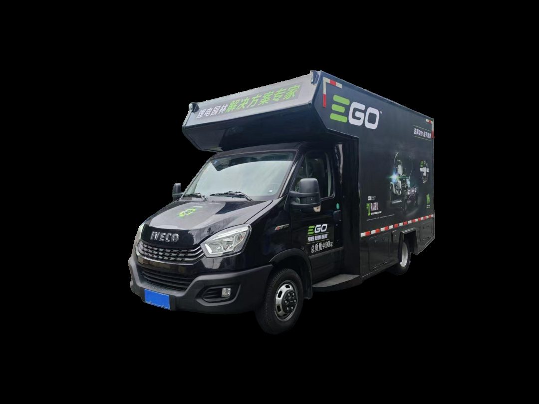 Mobile display vehicle with a full-height demonstration compartment built on a light commercial chassis