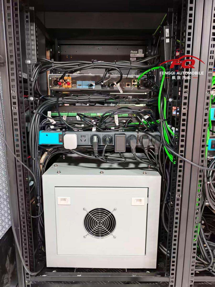 Isolation transformer installed below the equipment rack in a communication vehicle — each side keeps its own grounding.