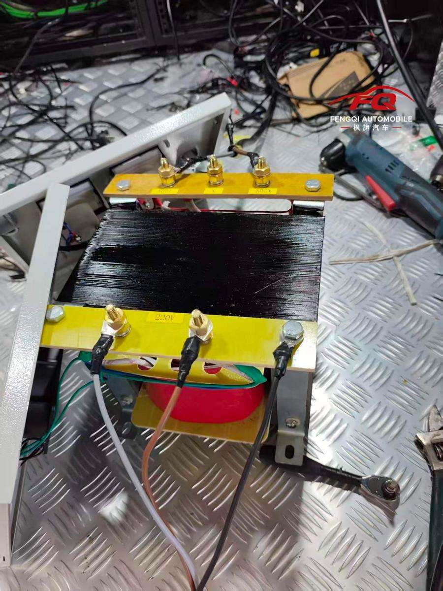 The isolation transformer fitted between the generator and the UPS — a small line on the bill of materials.